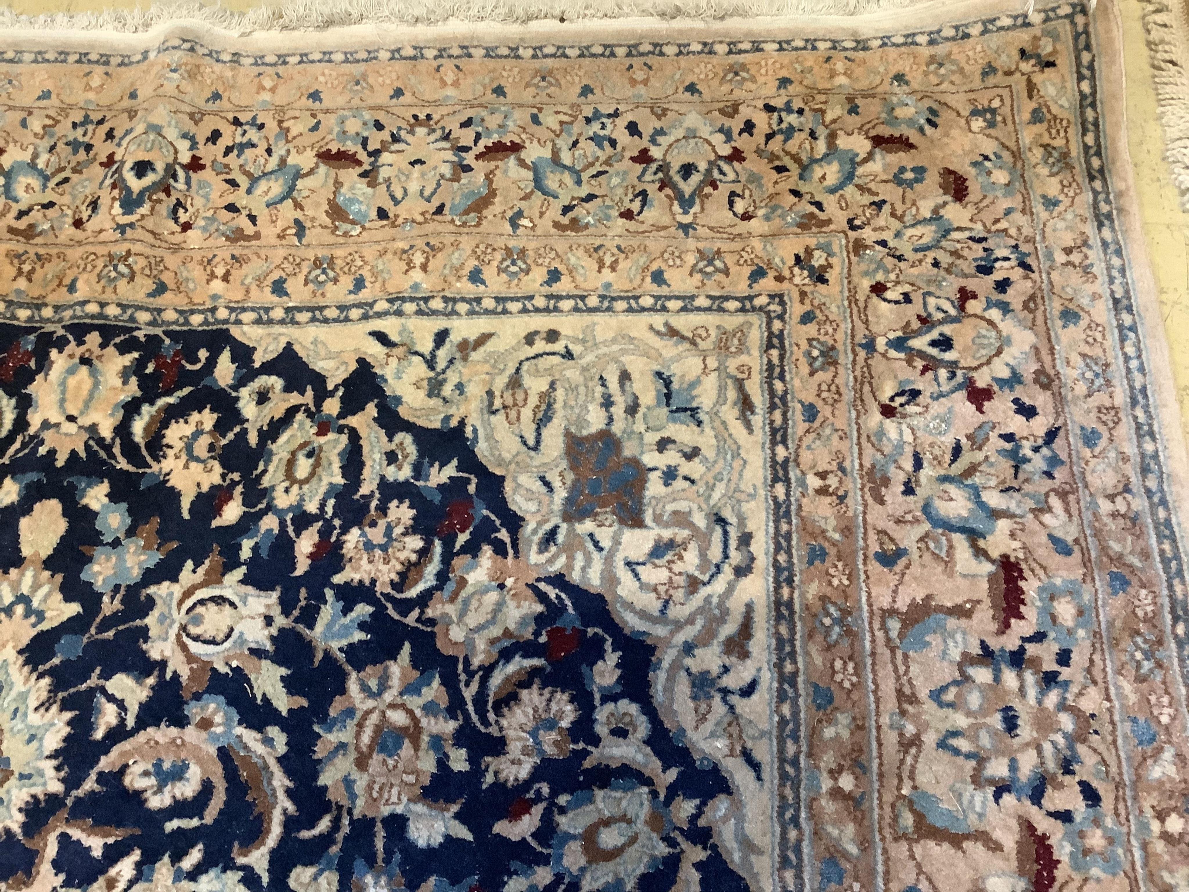 A Nain blue ground carpet, 277 x 174cm. Condition - fair to good